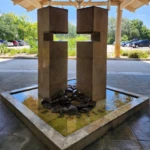 Fountain shaped like a cross.